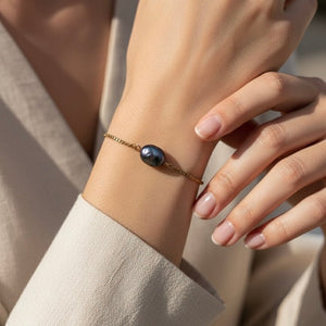 Bracciale con perla solitaria grigia - OE!