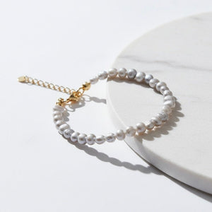 Bracciale con perle di fiume grigie – elegante e raffinato - OE!