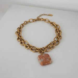 Collana in acciaio placcato oro 18k con pendente in Calcite Orange - OE!