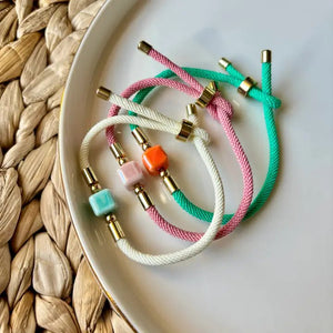 DADI - braccialetti di corda con dado centrale in ceramica. - OE!