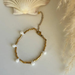 FIDUCIA – Bracciale dorato con gocce di cristallo - OE!