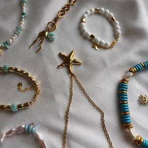 Positano Star - Collana con ciondolo a stella marina in oro - OE!