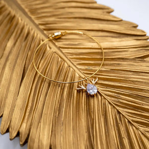 Reindeer - bracciale rigido dorato con ciondolo in cristallo - OE!