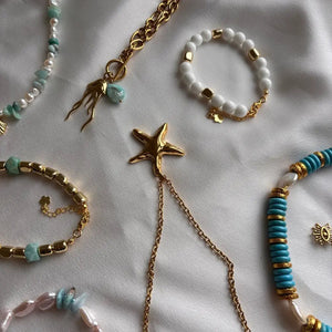 Riviera Bianca - Bracciale in cristalli bianchi e ematite dorata - OE!