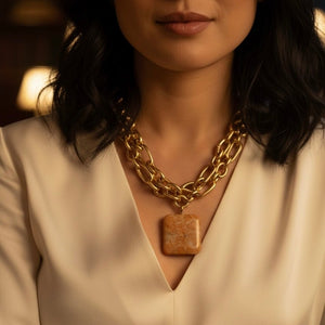 Collana in acciaio placcato oro 18k con pendente in Calcite Orange - OE!