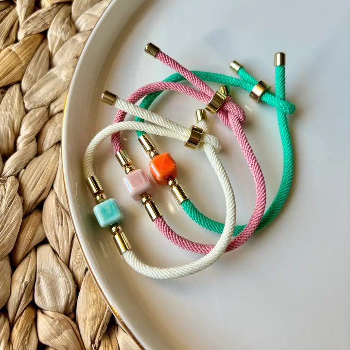 DADI - braccialetti di corda con dado centrale in ceramica. - OE!