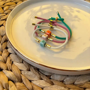 DADI - braccialetti di corda con dado centrale in ceramica. - OE!