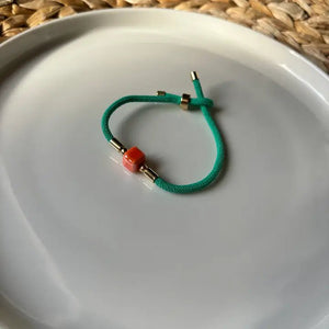 DADI - braccialetti di corda con dado centrale in ceramica. - OE!