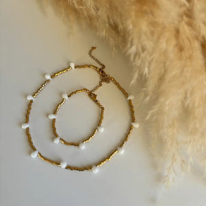 FIDUCIA – Collana dorata con gocce di cristallo - OE!