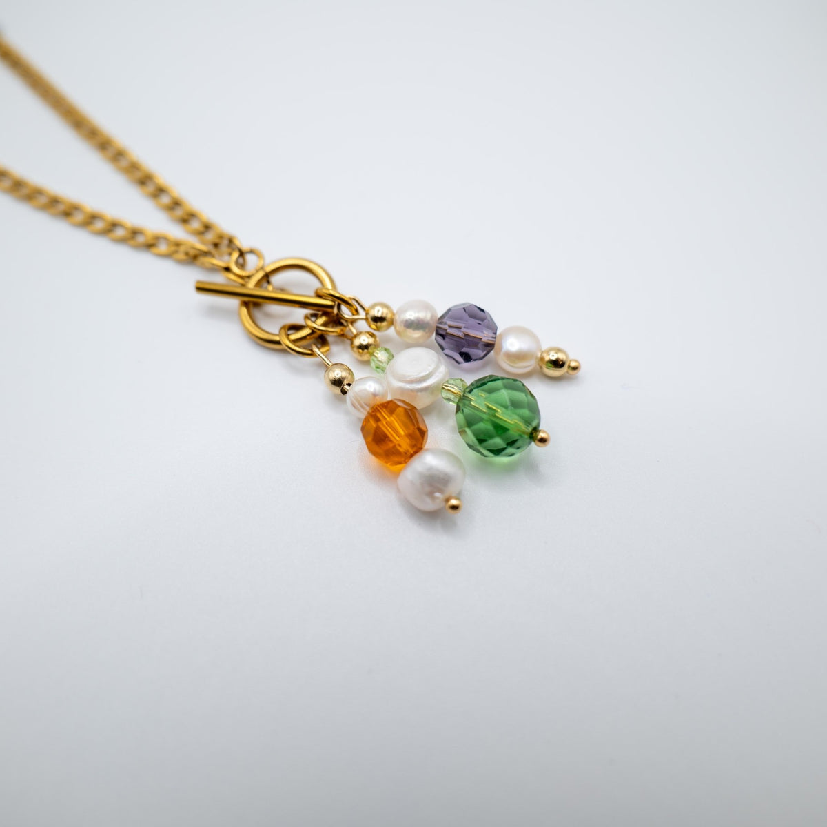 LAPILLI - Collana a catena con ciondoli in perle e cristalli - OE!