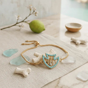 Positano soul bracciale oro 18k e acciaio occhio turco e turchese - OE!