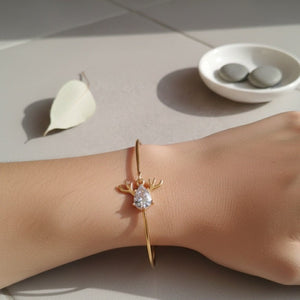 Reindeer - bracciale rigido dorato con ciondolo in cristallo - OE!
