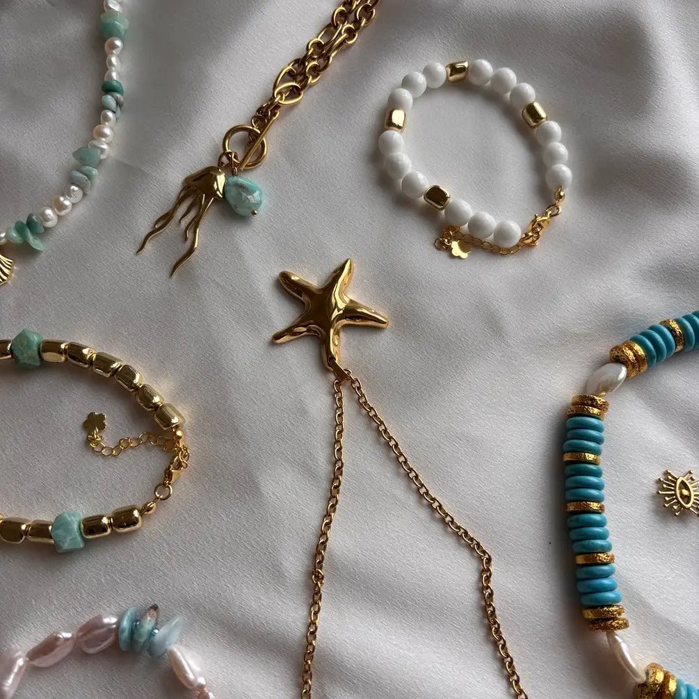 Riviera Bianca - Bracciale in cristalli bianchi e ematite dorata - OE!