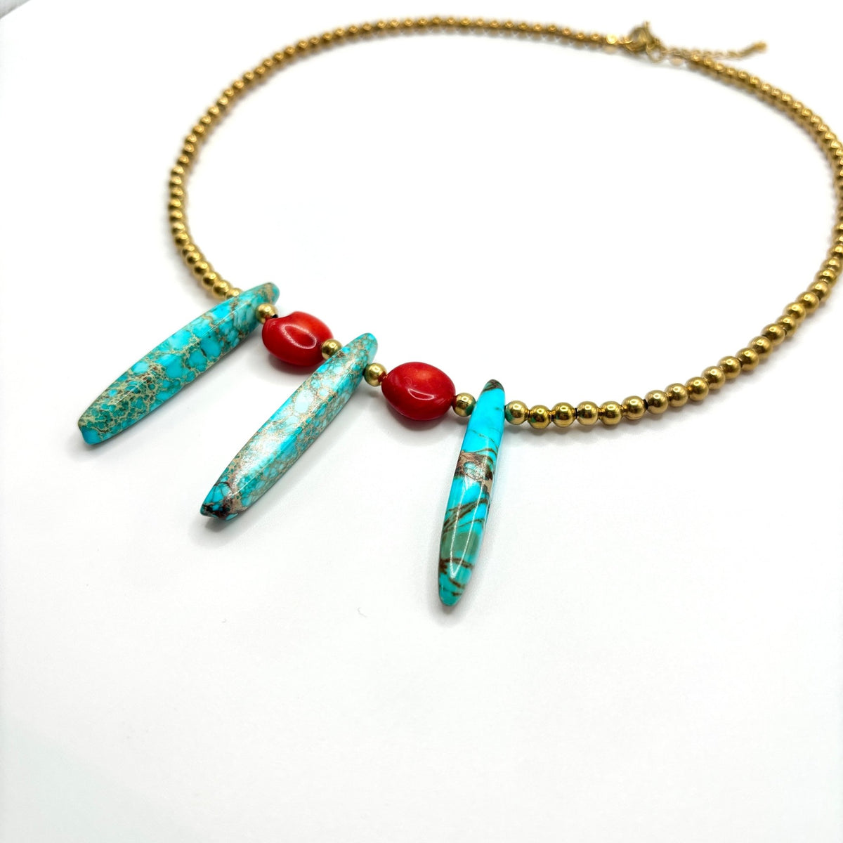 SCHEGGE - Collana con diaspro turchese e corallo bamboo - OE!