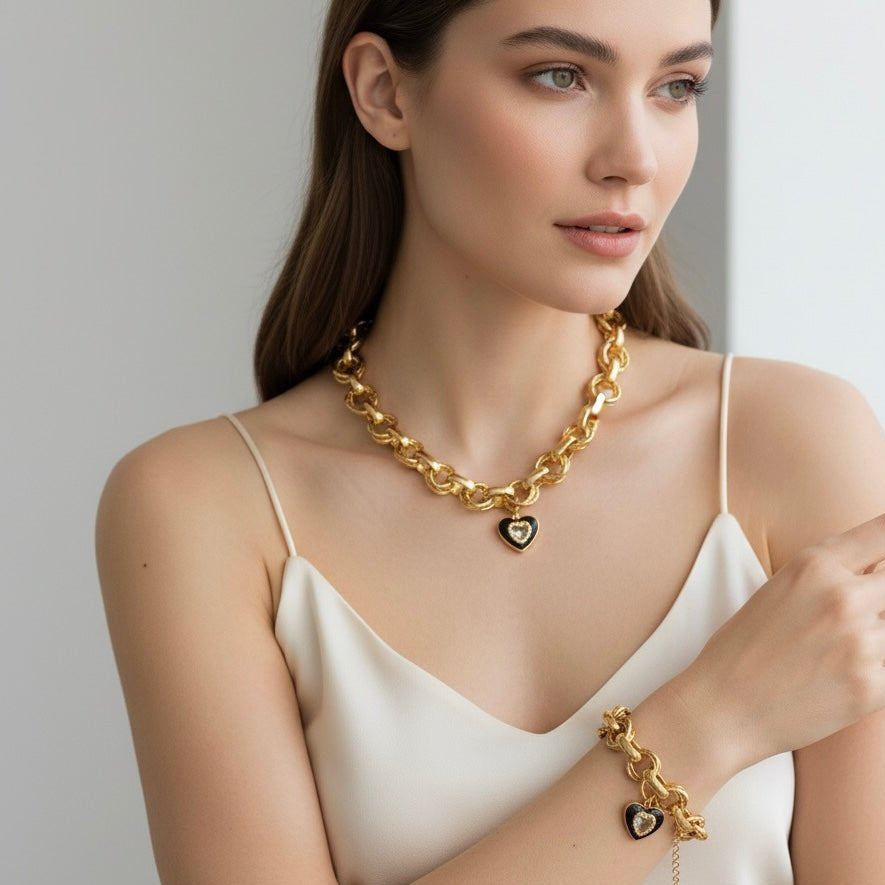 Seraphine – Bracciale in acciaio oro 18K con cuore nero e zircone - OE!