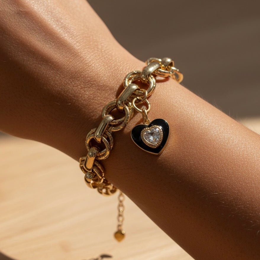 Seraphine – Bracciale in acciaio oro 18K con cuore nero e zircone - OE!