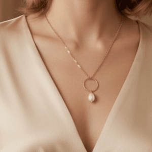 Unica collana acciaio inox oro 18K perla di fiume e sfera